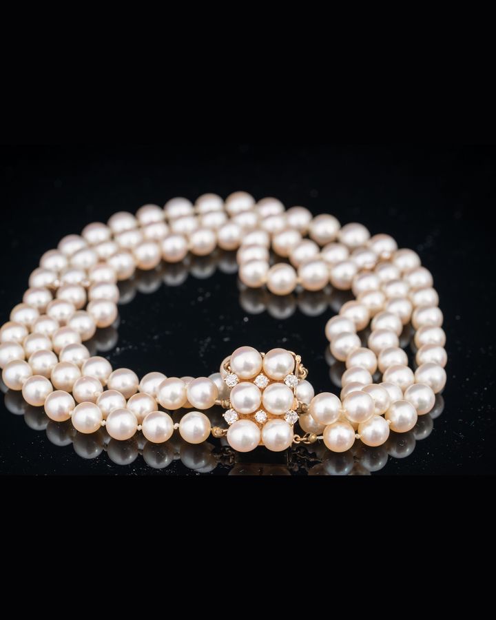 Lot 675: Three-Strand Pearl Necklace with 14K Gold, Pearl and Diamond Cluster Clasp