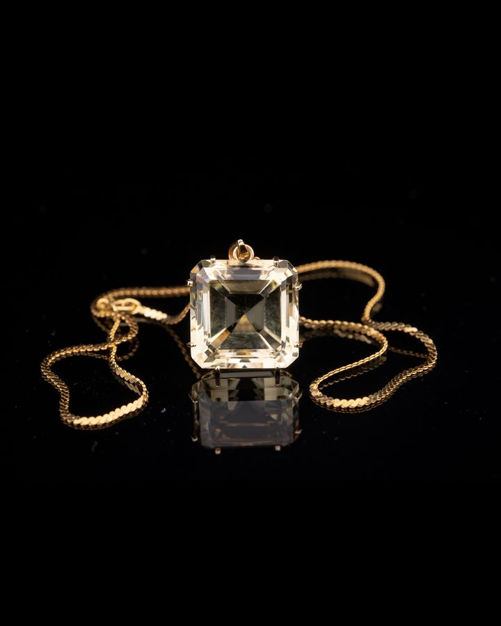 Lot 683: 14K Gold Pendant with Large Asscher-Cut Pale Yellow-Green Stone
