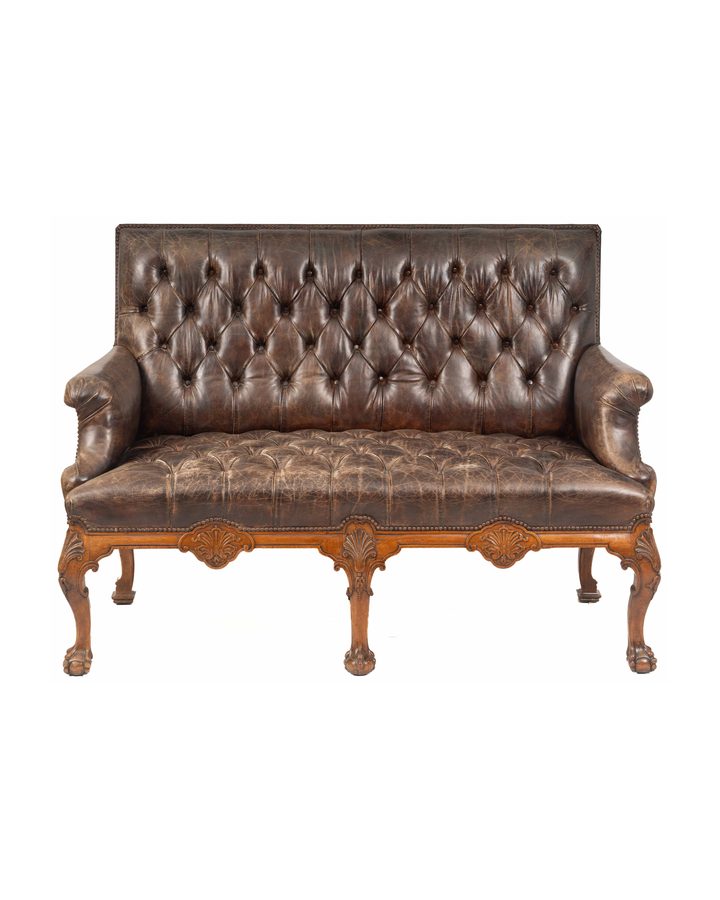 Lot 344: Carved Walnut Tufted Leather Chesterfield Settee with Ball-and-Claw Feet